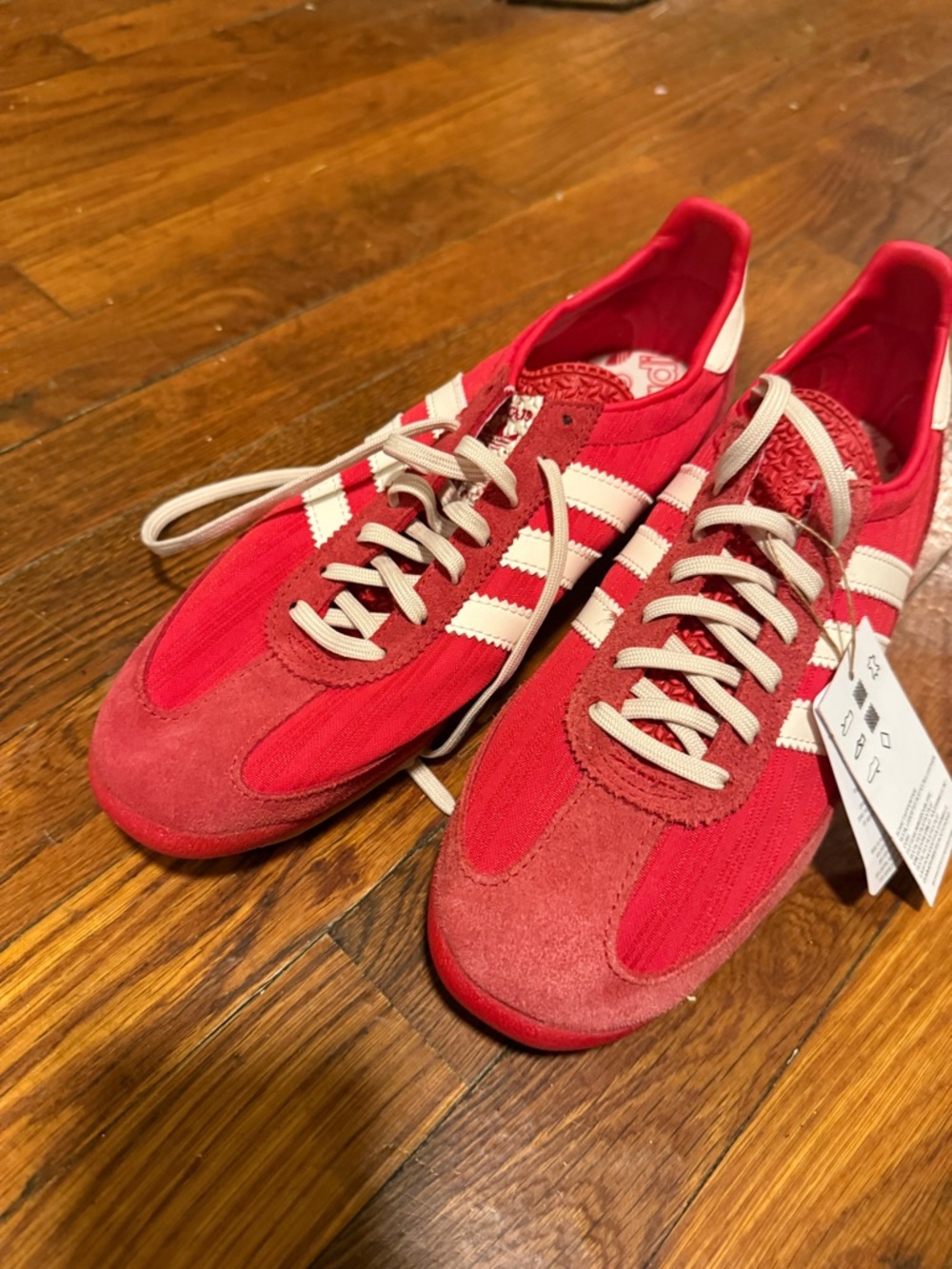 adidas Women's Red Sneakers with White Stripes